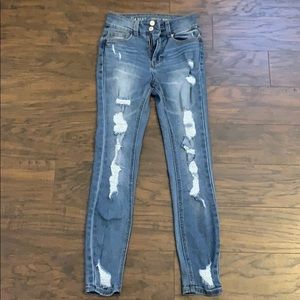 Distressed high rise medium wash jeans